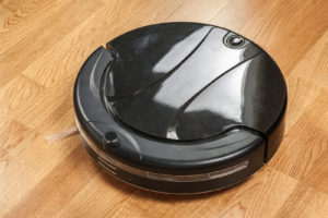 Odin is a robot vacuum cleaner one meter in diameter with a shiny black cover. He works for Danish seniors.